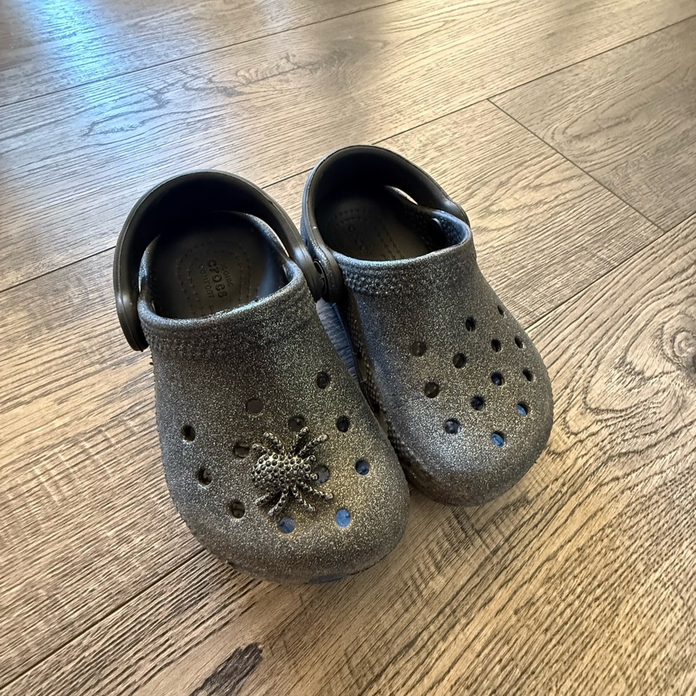 CROCS Black Glitter Clogs with Spider Charm